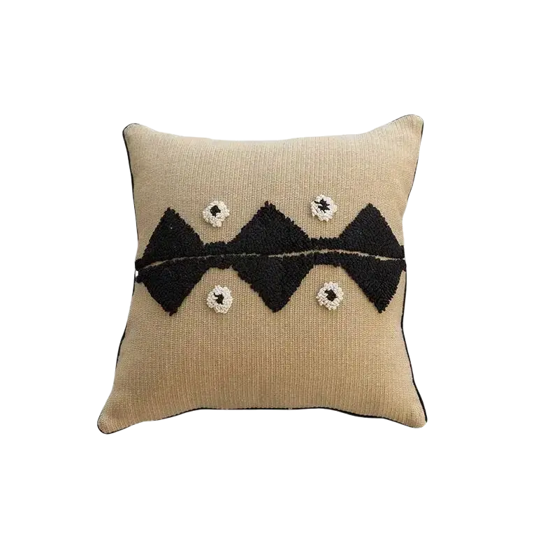Beige boho throw pillow cover with black geometric embroidery and white circular accents for living room decor