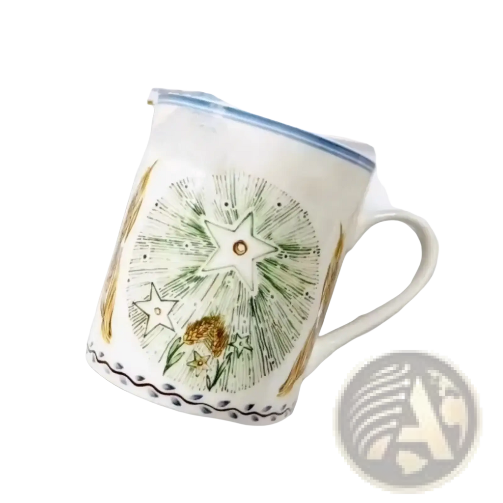 Bone china coffee mug with white ceramic and hand-painted celestial design in green and gold accents
