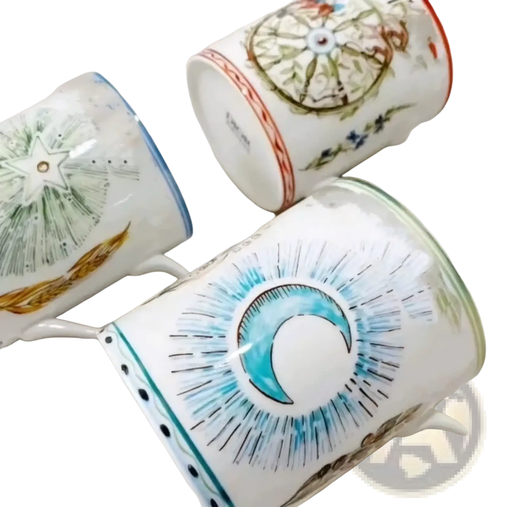 Bone china coffee mugs with hand-painted blue green and brown celestial designs in retro floral ceramic style