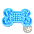 Light blue silicone bone puzzle slow feeder dog bowl with textured maze compartments for slow feeding