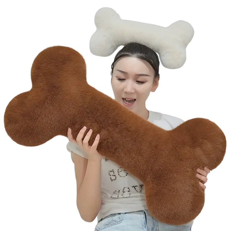 A brown kawaii bone shape plush pillow with soft faux fur texture ideal for a comfortable nap cushion
