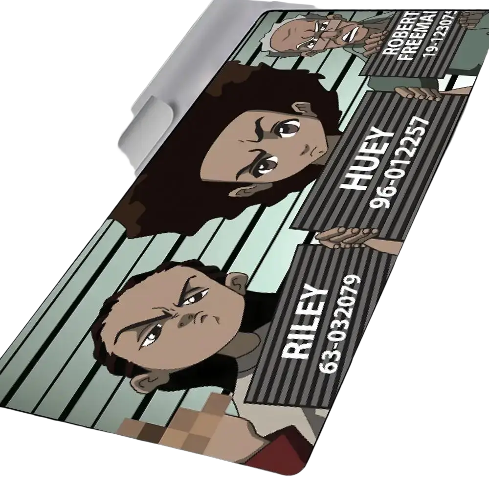 The boondocks mouse pad featuring a long rectangular rubber mat with cartoon jail mugshot design and printed details