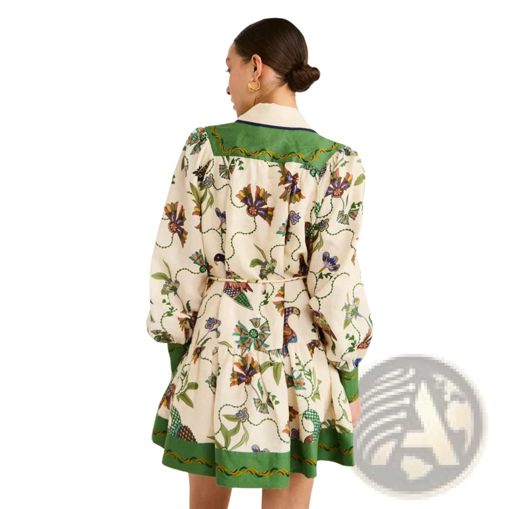 Cream-colored botanical print puff sleeve midi dress with vibrant flowers birds vines and emerald green contrast trim
