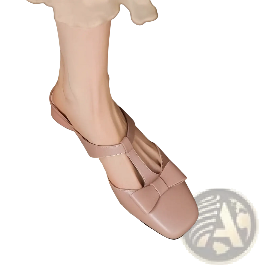 Beige leather bow closed toe mule flats for women featuring a square toe and decorative bow on the vamp