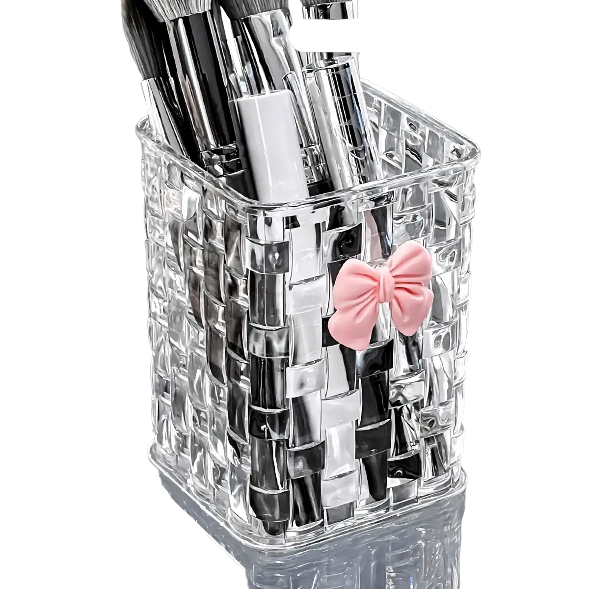 Clear woven-patterned acrylic bow pen holder with pink bow accent for desktop storage organizer