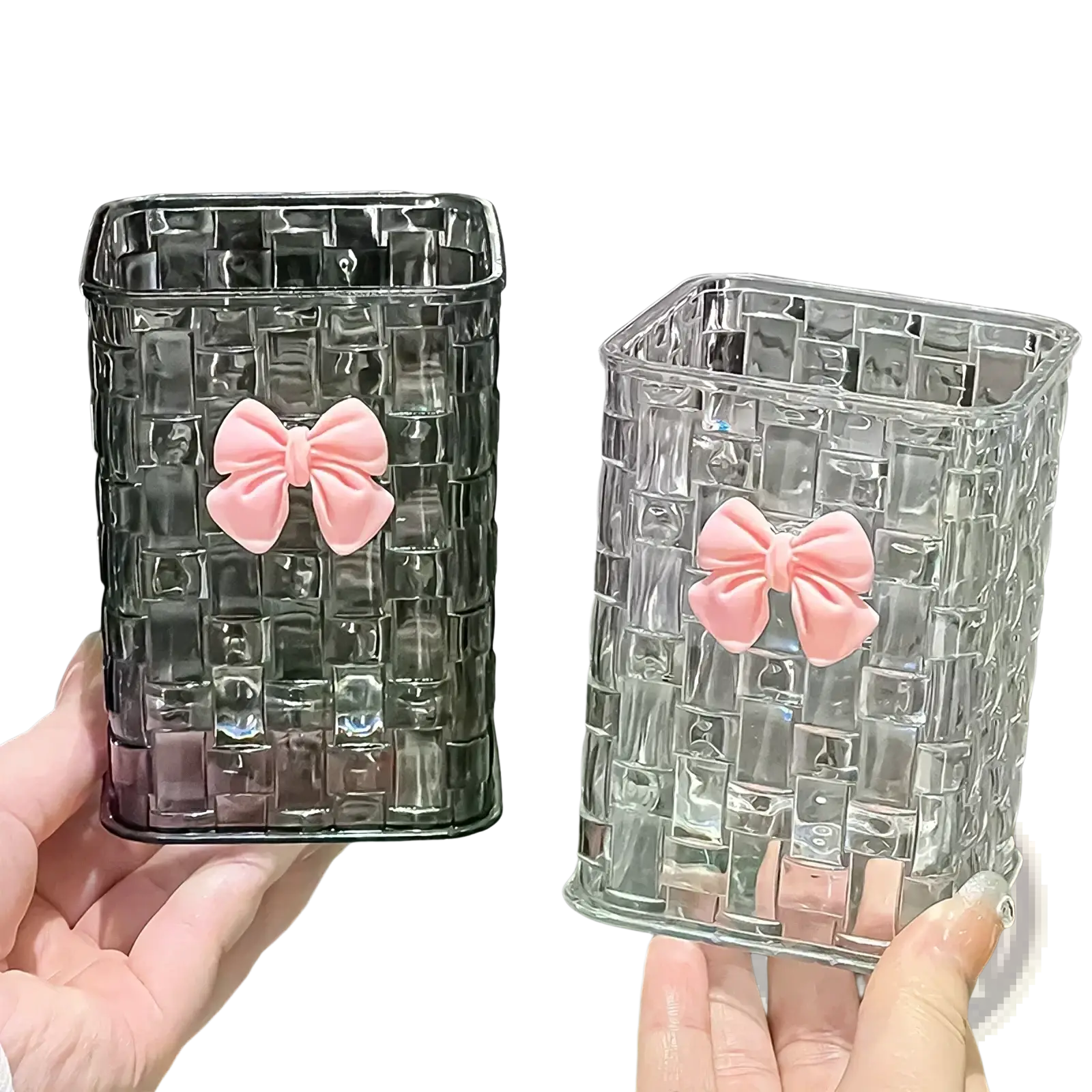 Transparent glass rectangular pen holder with woven texture and pink bow accents for desktop storage organizer