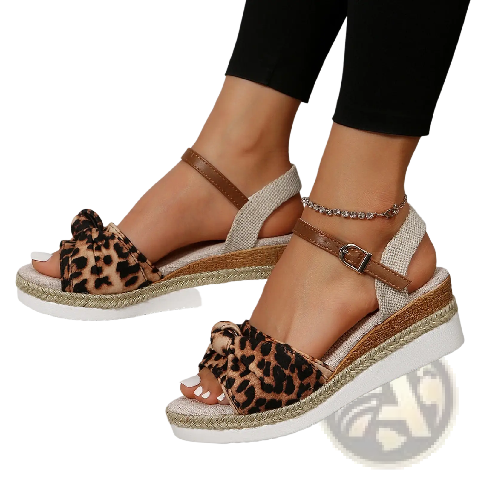 Bow wedge sandals featuring leopard-print upper, woven rope espadrille sole, and brown leather ankle buckle strap