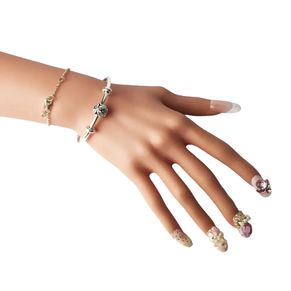 Silver bracelet bangles classic open cuff with ornate floral charm and textured surface in bangles classic design