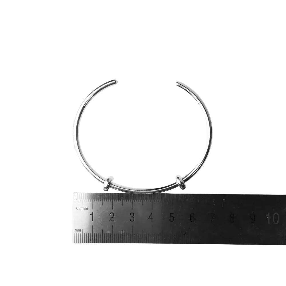 Silver-toned bracelet bangles classic open cuff with sleek minimalist design and adjustable clasp mechanism