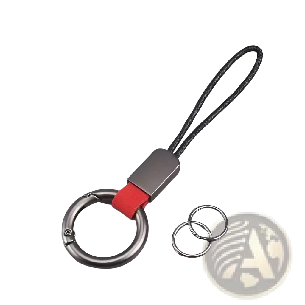 Silver-toned braided leather car keychain with textured black cord, red fabric accent, and metallic carabiner clip