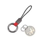 Silver-toned braided leather car keychain with textured black cord, red fabric accent, and metallic carabiner clip