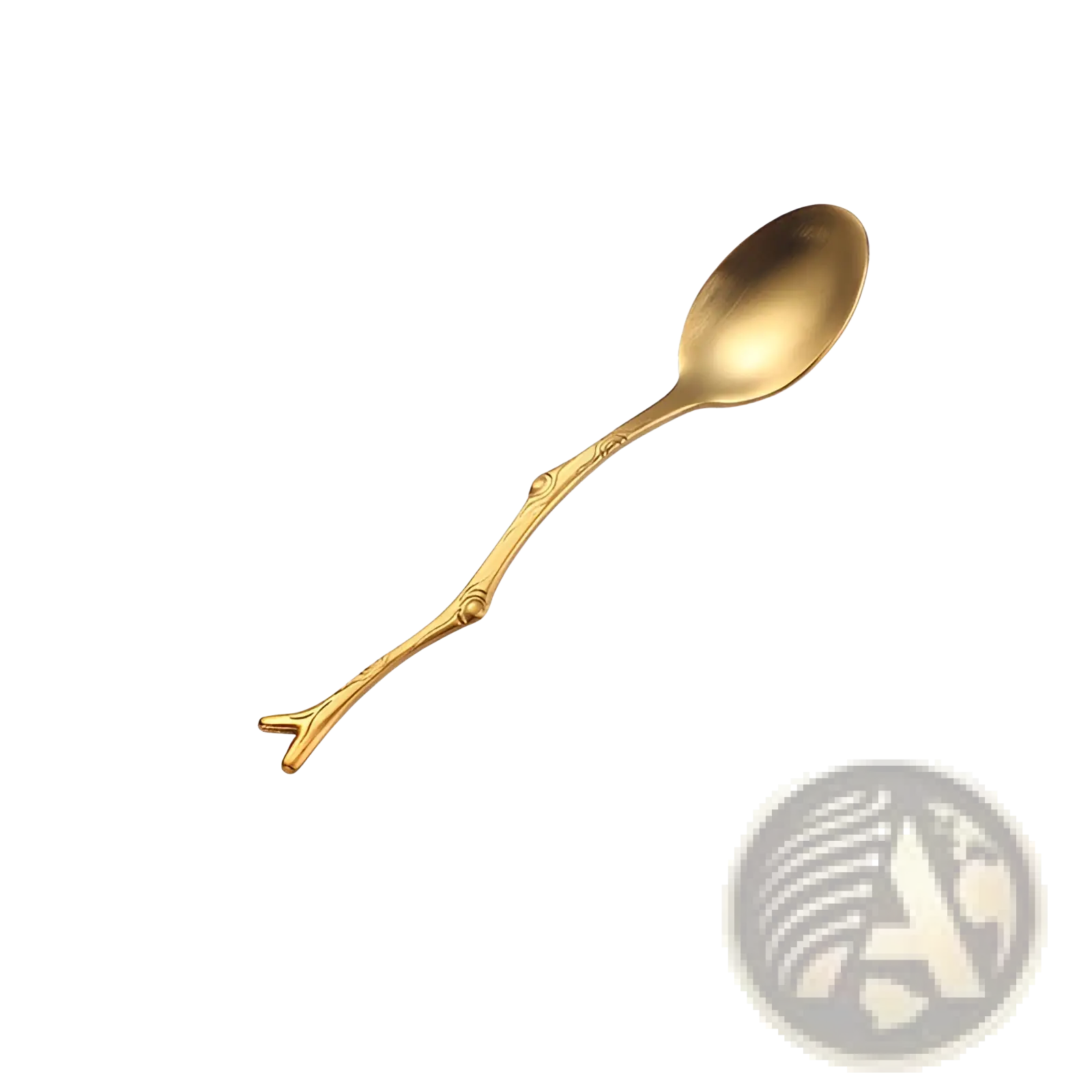 Golden stainless steel dessert spoon with tree branch-inspired handle and subtle engraved details from branch cutlery set