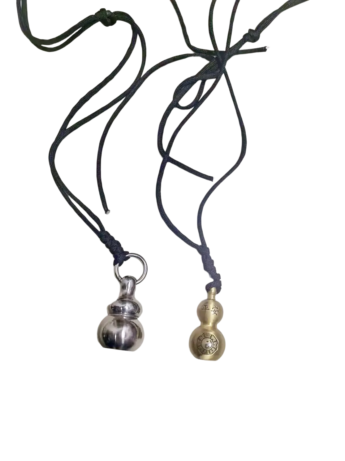 Two metallic silver and gold-toned brass gourd self defense pendant necklaces with engraved characters on black cords