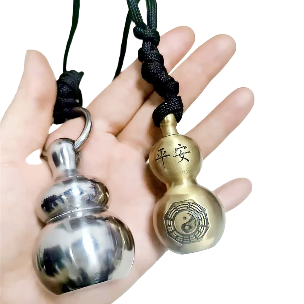 Two metallic gourd self defense pendant necklaces in silver and brass with engraved chinese symbols on black cords