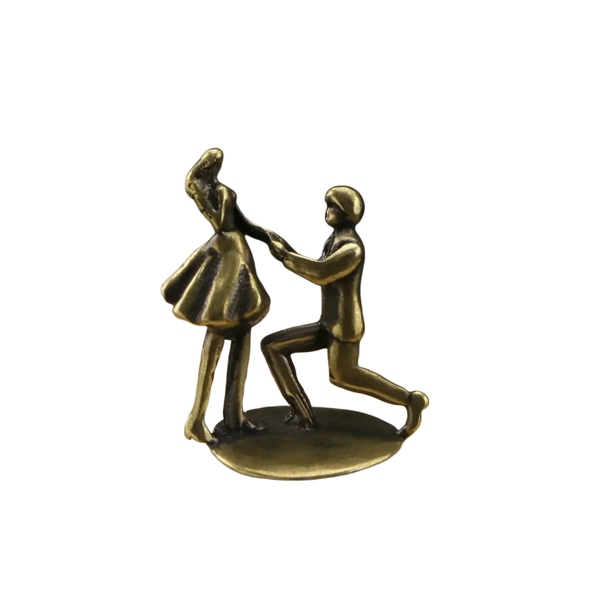 Brass-colored miniature figurine of a man proposing on one knee to a woman for desk decor display