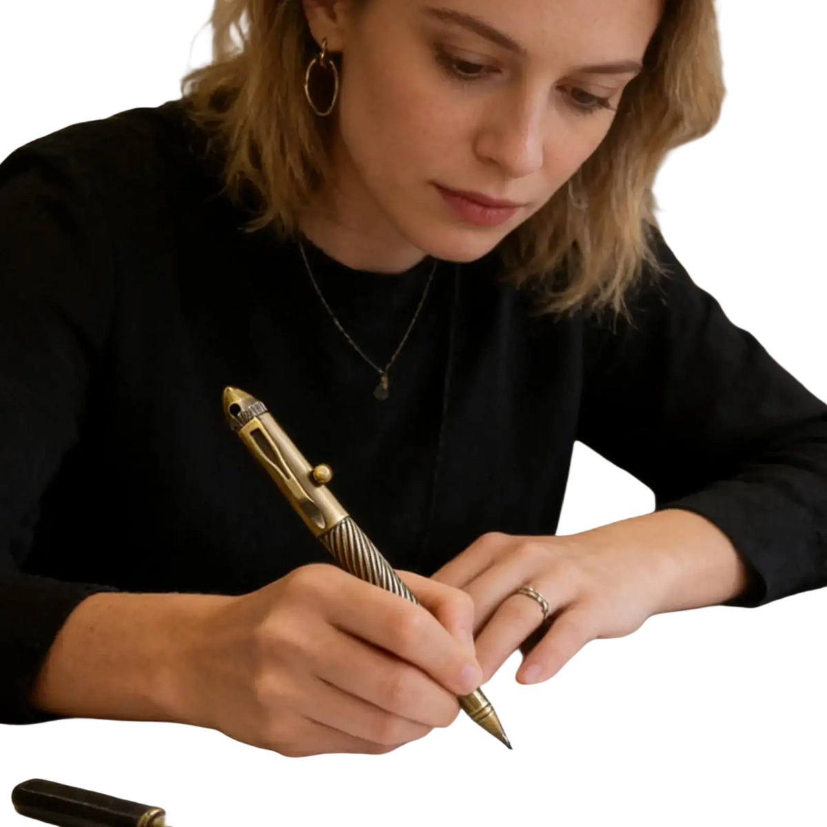 Brass retro travel pen for men with a twisted metallic body and gold-toned accents