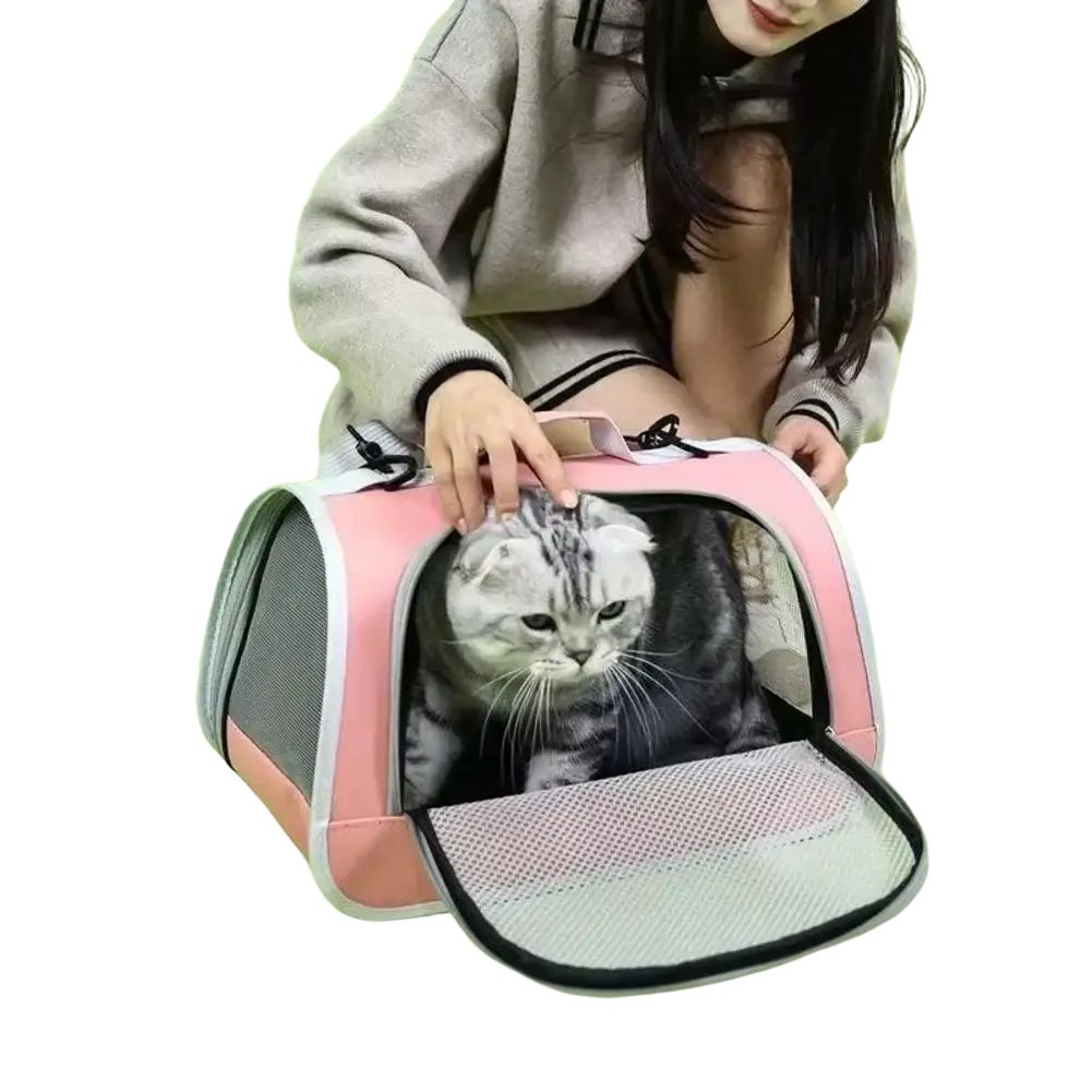 Breathable mesh pet carrier shoulder bag in pink and gray with mesh sides and soft interior for safe transport
