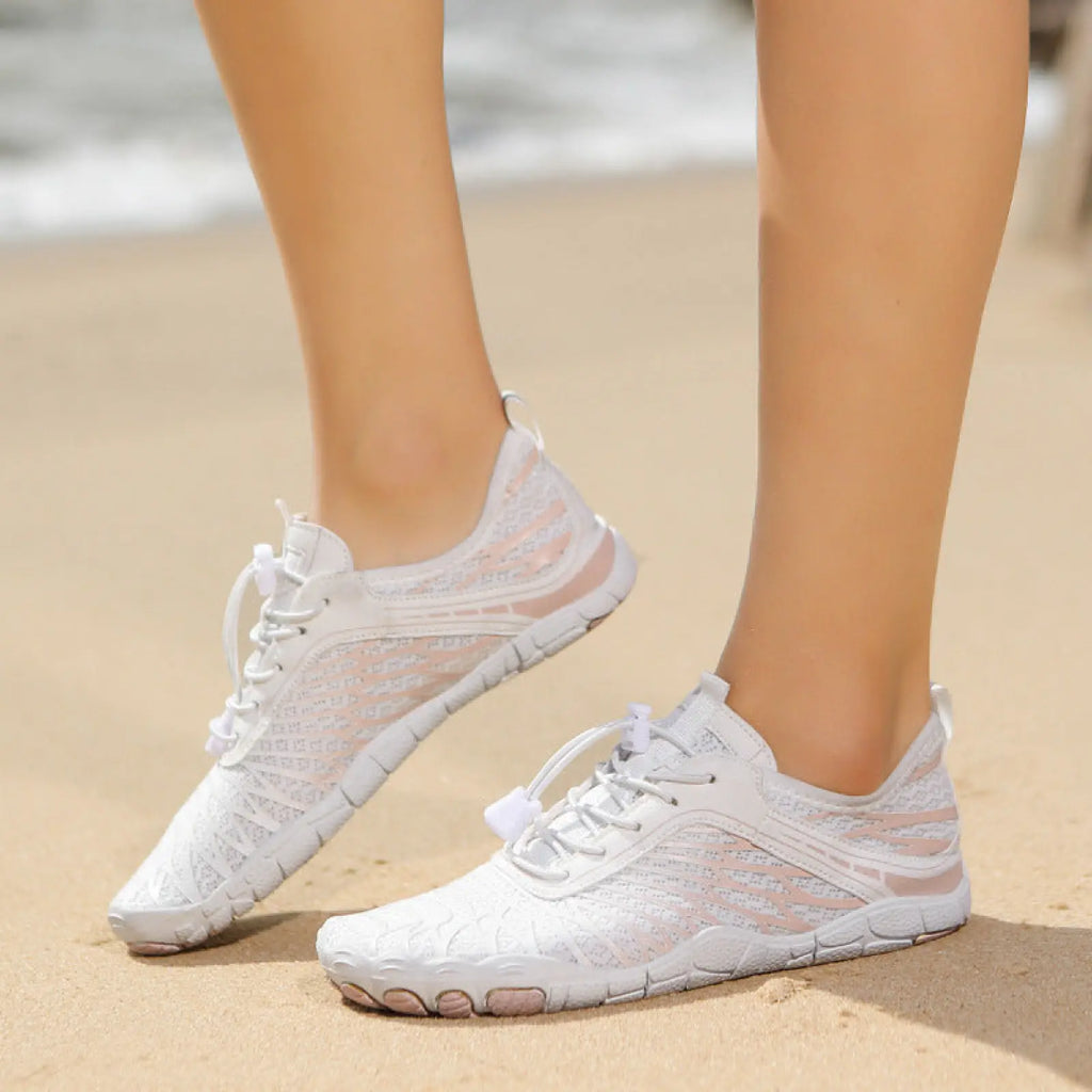 Breathable non slip quick dry white mesh water sports shoes with lightweight design and subtle pink accents on the sides