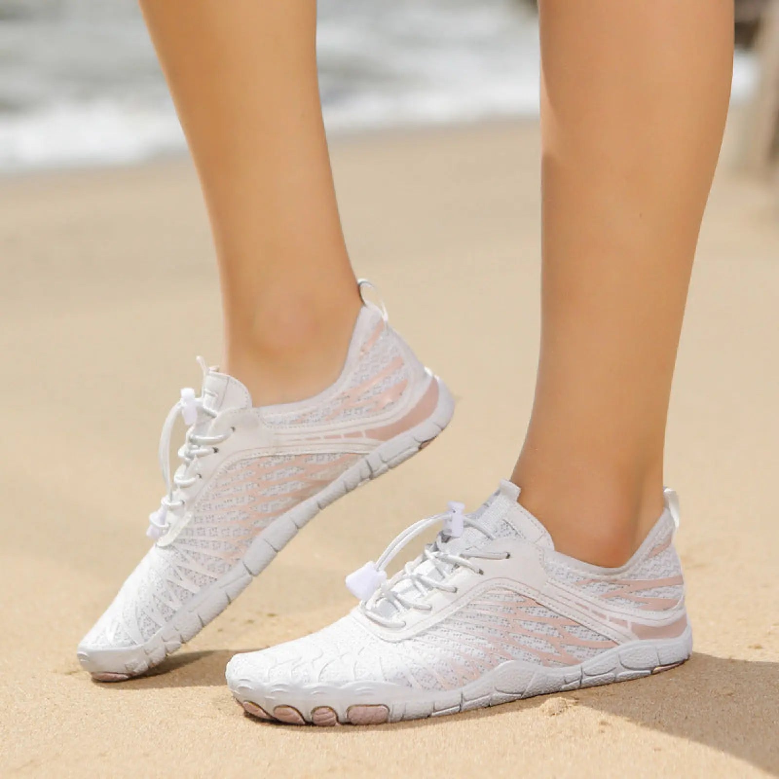 Breathable non slip quick dry white mesh water sports shoes with lightweight design and subtle pink accents on the sides