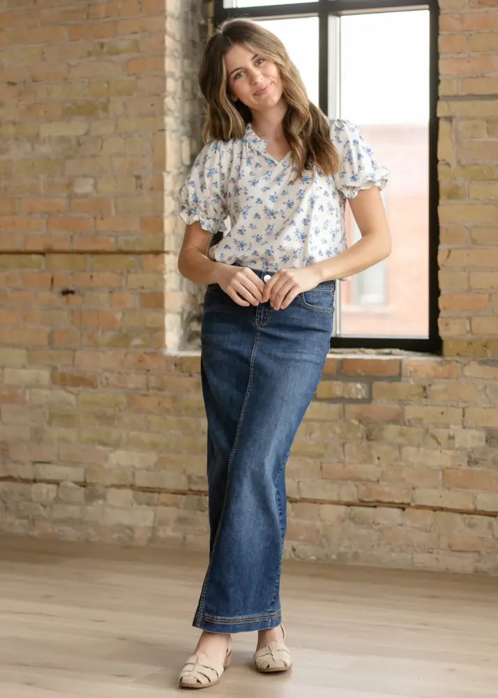 Bria dark wash denim maxi skirt with side slit featuring blue denim flare skirt design and visible hem stitching