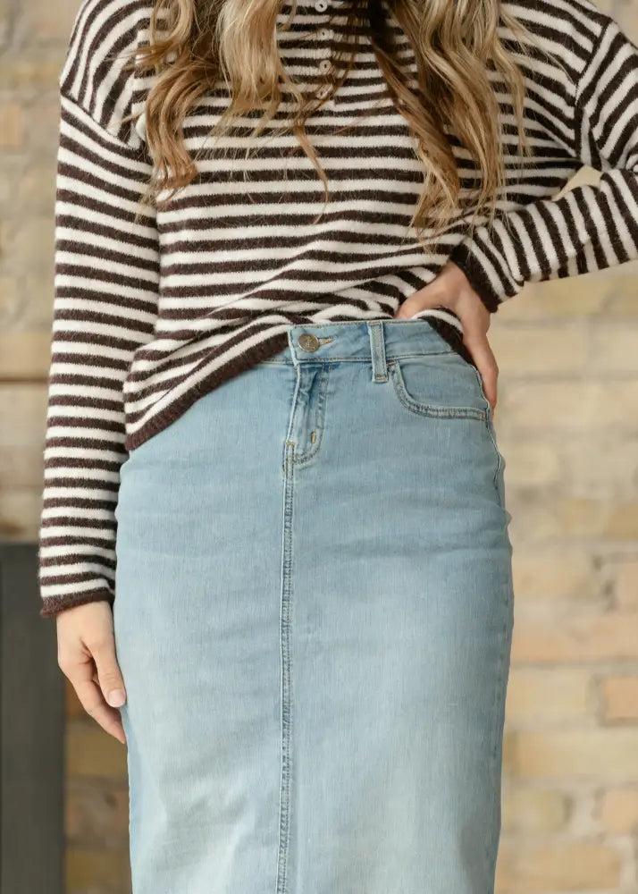Bria light wash sustainable denim midi skirt with classic front button closure and side seam detailing