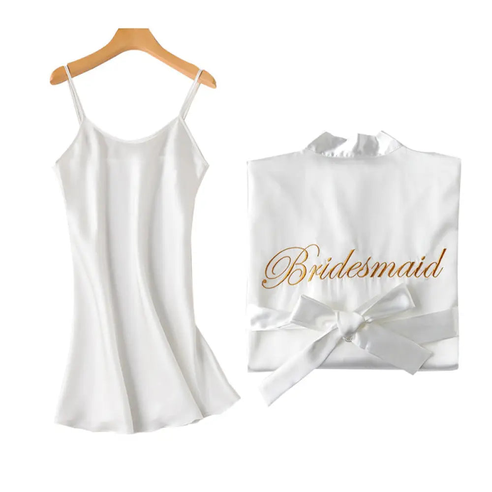 White satin bridesmaid robe with gold cursive bridesmaid lettering and matching satin waist bow from embroidered satin bridal nightgown set