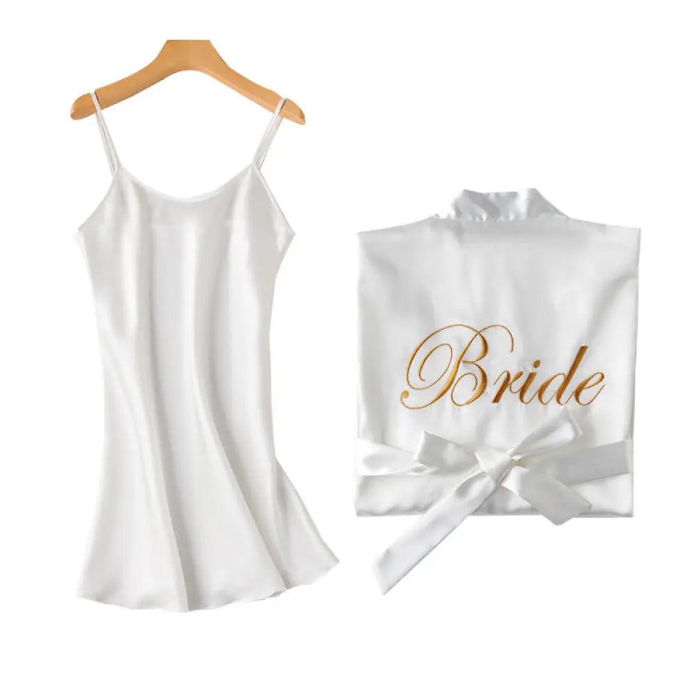White satin bridesmaid robe with gold bride script and matching bow tie from embroidered satin bridal nightgown set