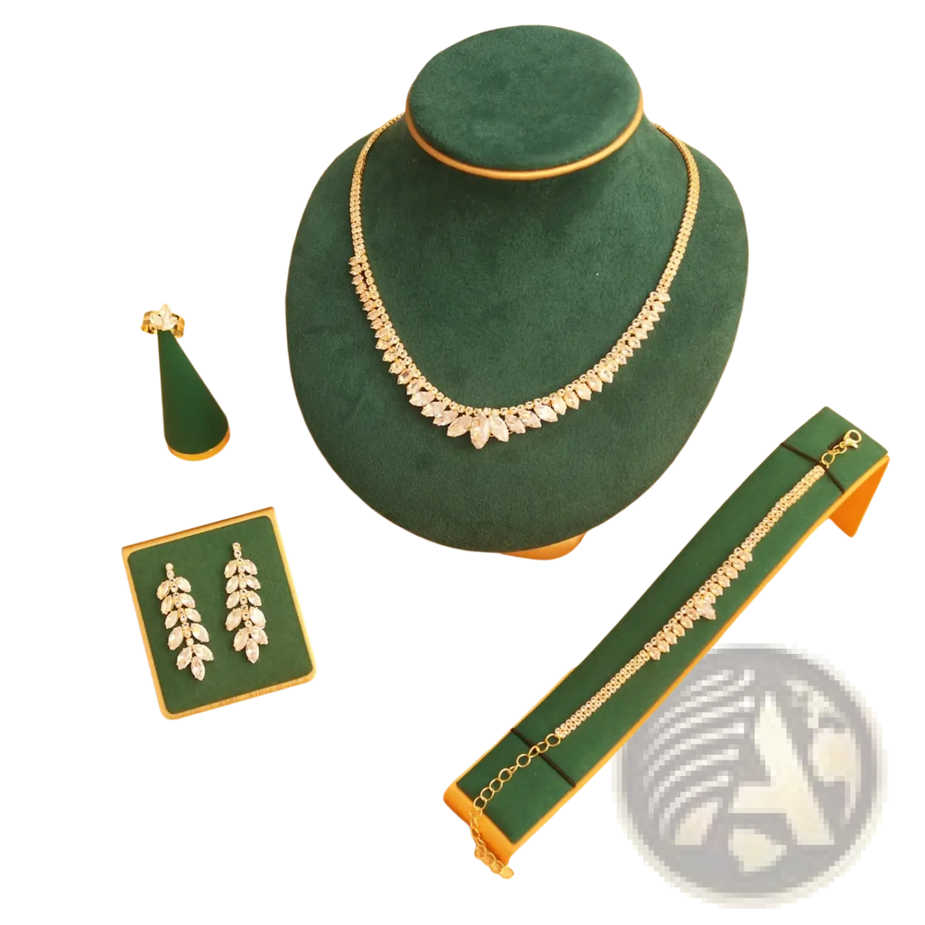 Gold-toned bridal crystal necklace with marquise-cut crystals in leaf design on dark green velvet bust display