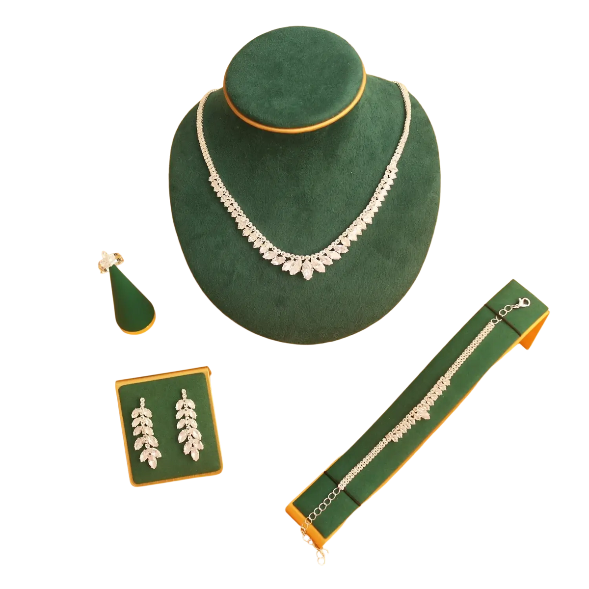 Silver leaf-patterned necklace in bridal crystal jewelry set displayed on green velvet mannequin for wedding accessories