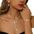 Gold-toned diamond-encrusted bridal necklace with cascading ornate pendant design in diamond jewelry set