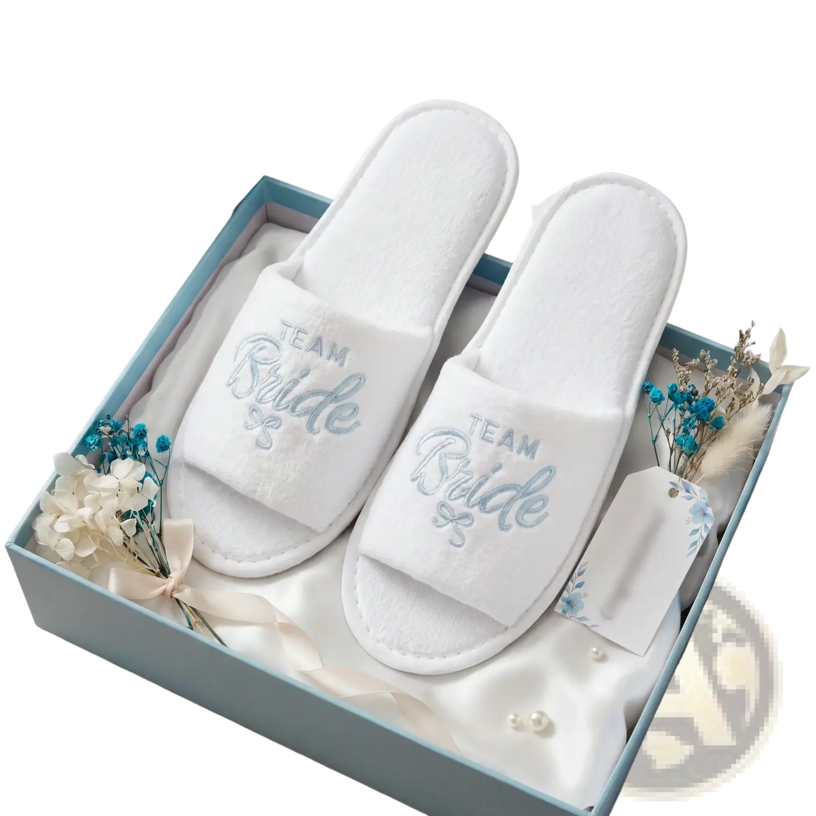 White plush bridal party slippers with team bride embroidered in silver inside a light blue gift box