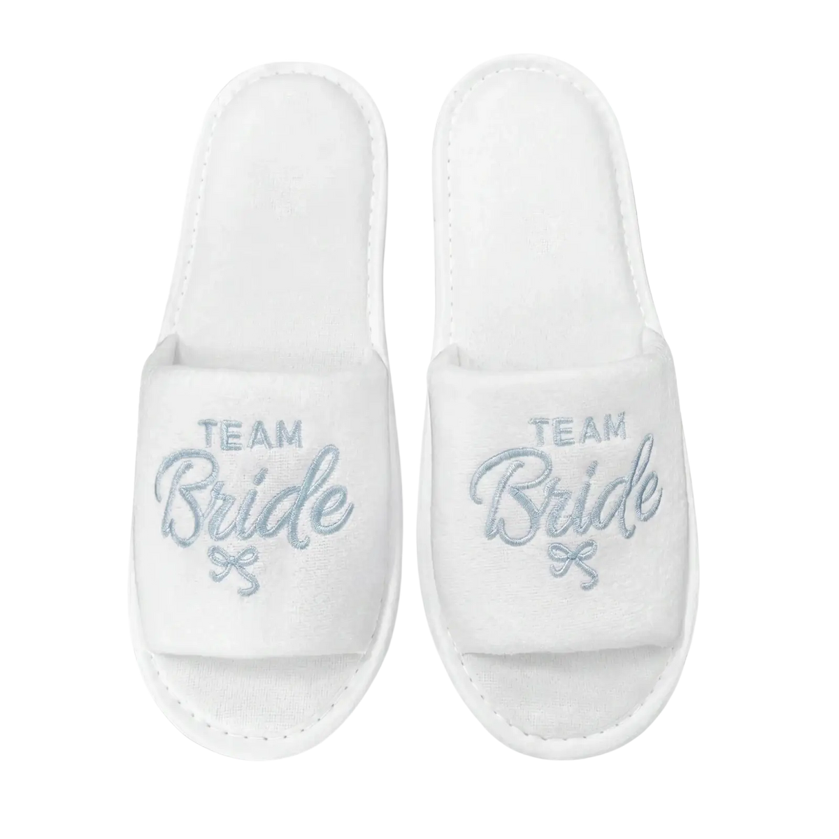 White plush slip-on bridal party slippers with team bride silver embroidery and small bow design for bridal gifts