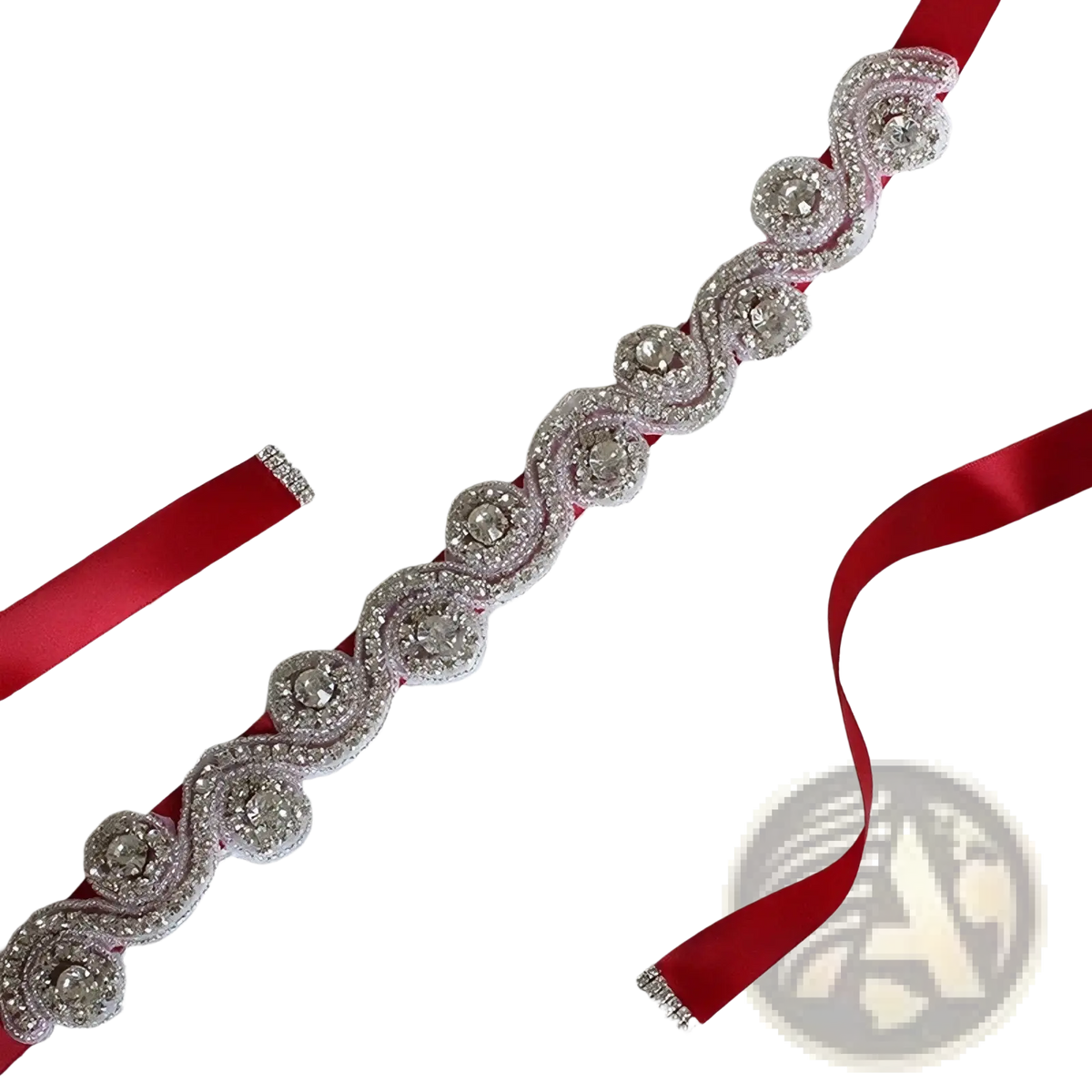 A red satin bridal rhinestone sash belt adorned with silver-toned crystal-encrusted swirling medallions