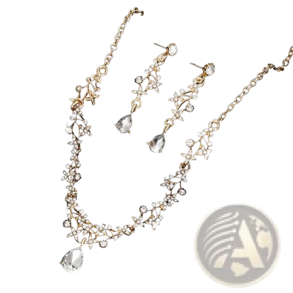 Bridal rhinestone vine jewelry set featuring gold-toned necklace and earrings with clear crystals and teardrop pendants