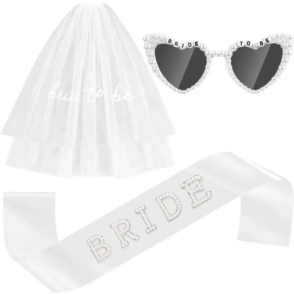 Bride to be accessory set featuring a white sheer veil satin sash with rhinestones and heart-shaped pearl sunglasses
