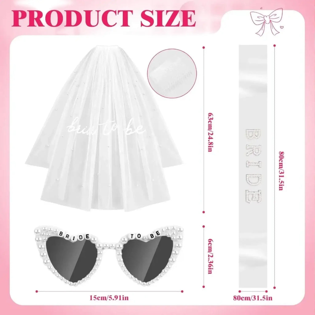 White tulle bridal veil with pearl embellishments and bride to be sash in soft cursive from accessory set