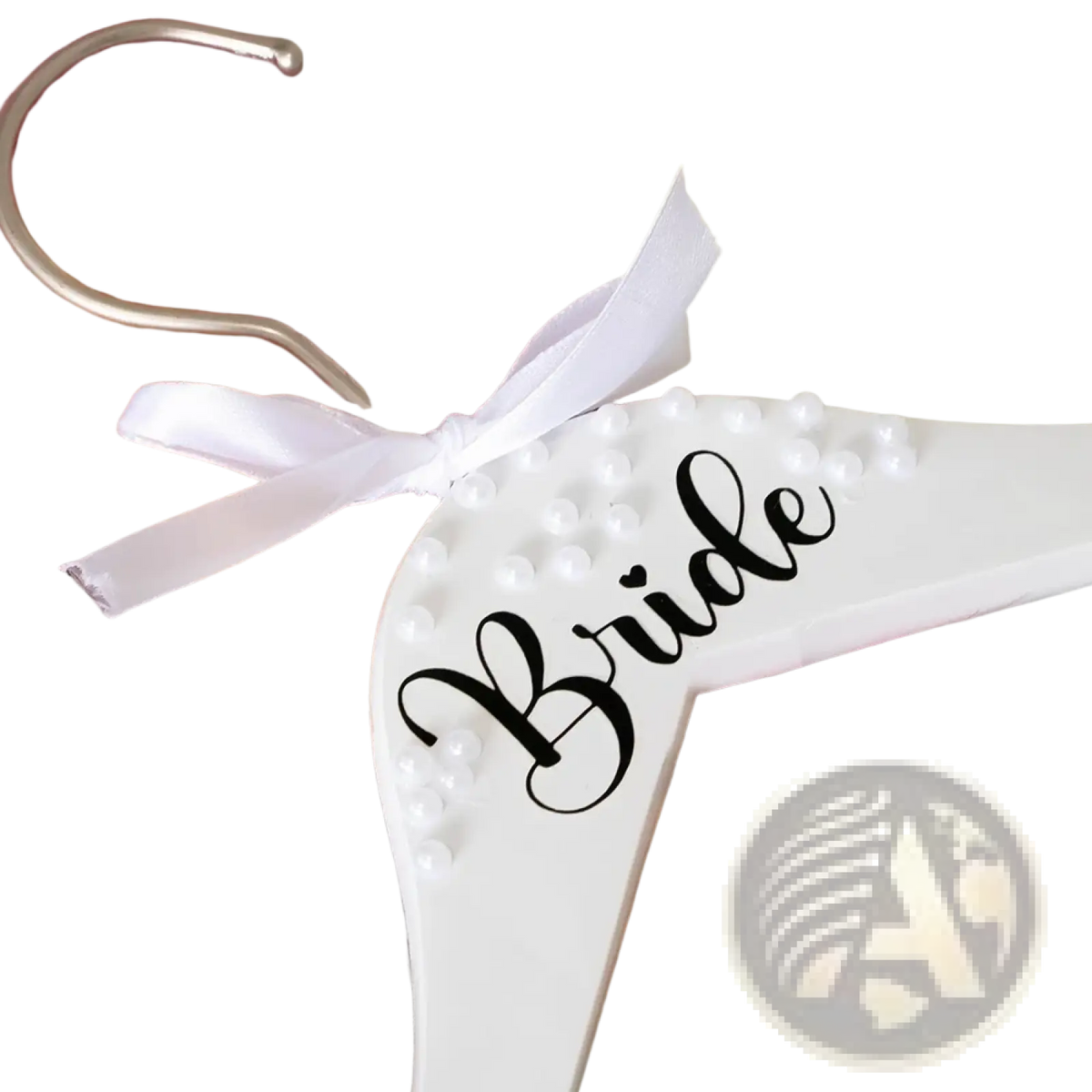 White wooden bride hanger adorned with pearls and black cursive lettering tied with white satin ribbon for weddings