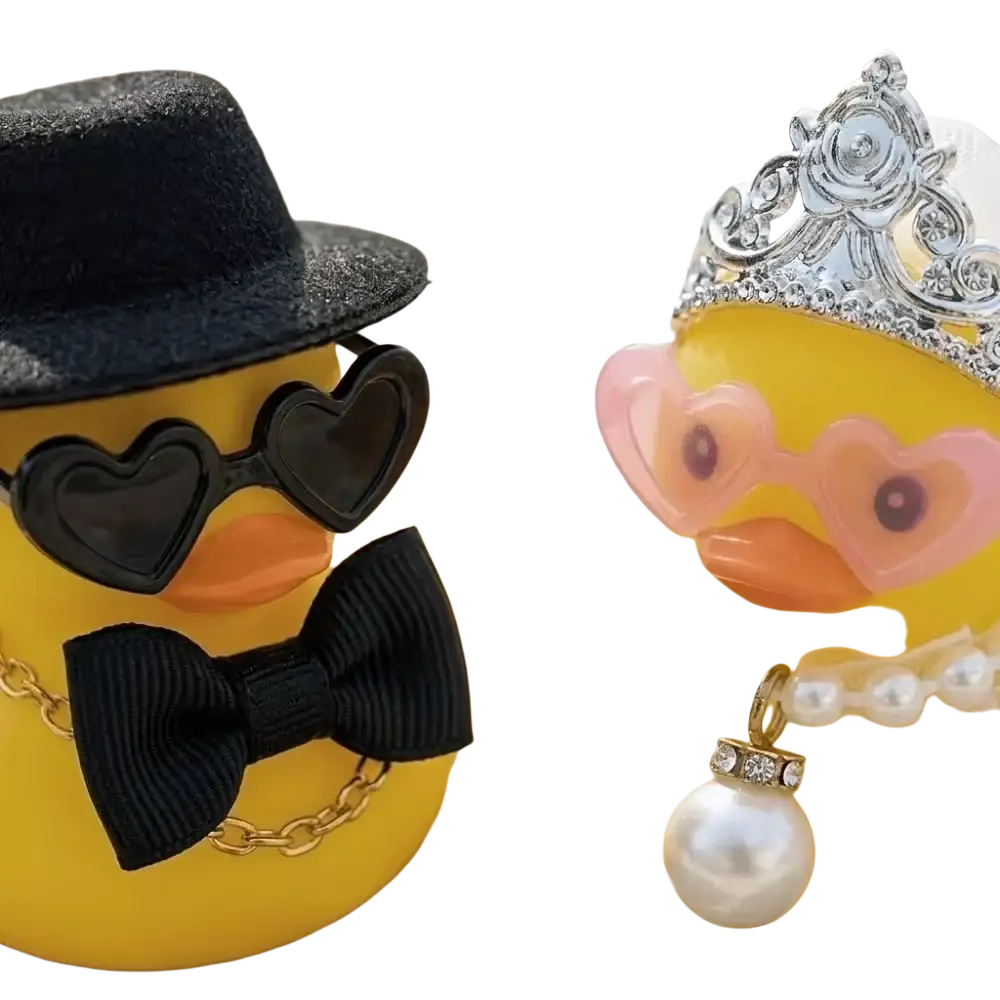 Bride and groom rubber duck wedding set featuring yellow rubber ducks dressed as bride and groom with accessories