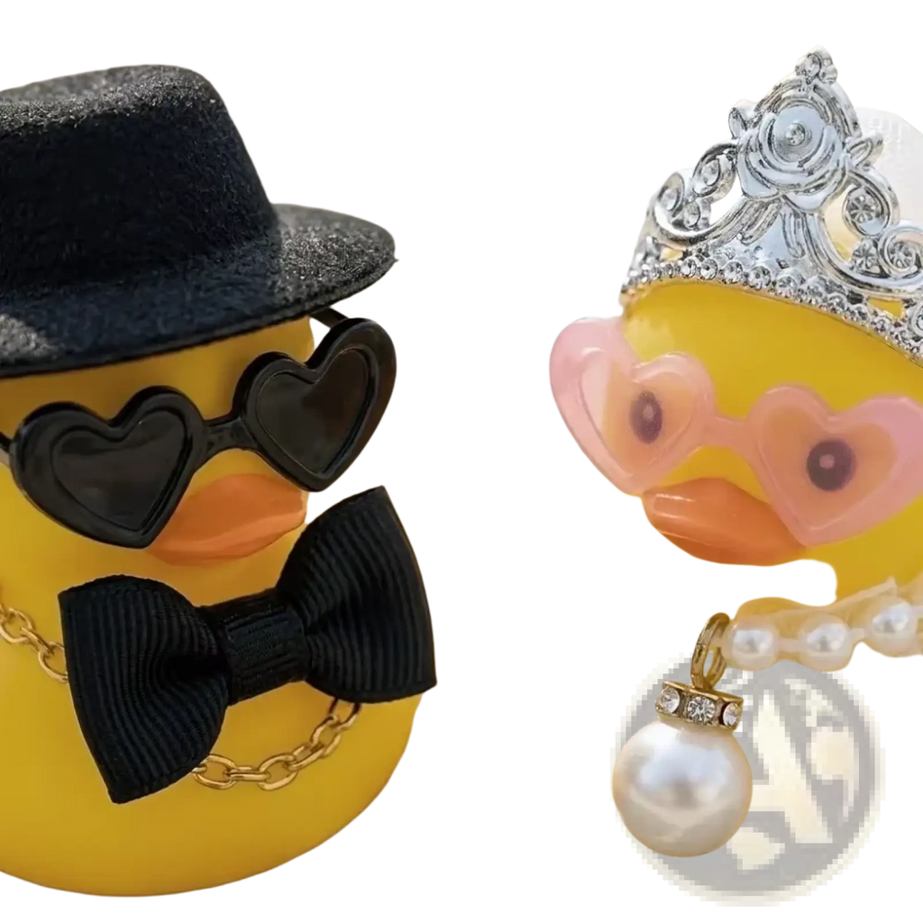 Bride and groom rubber duck wedding set featuring yellow rubber ducks dressed as bride and groom with accessories