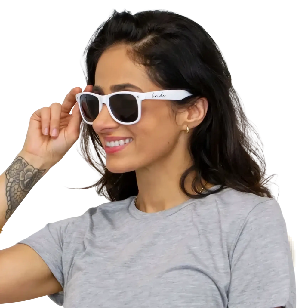White framed sunglasses with dark lenses and bride inscription on the temple for wedding party eyewear