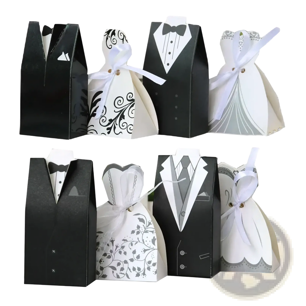 Elegant black and white paper bride and groom wedding favor candy boxes designed as tuxedos and dresses with satin ribbons