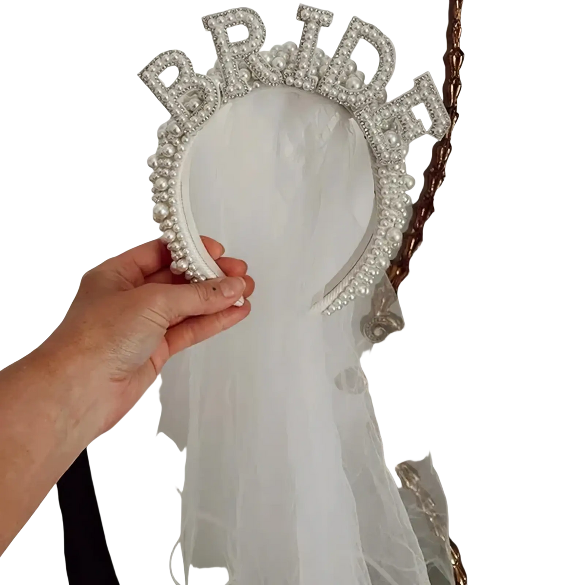 A sparkling white bride headband pearl crown adorned with rhinestones and pearls for wedding veils