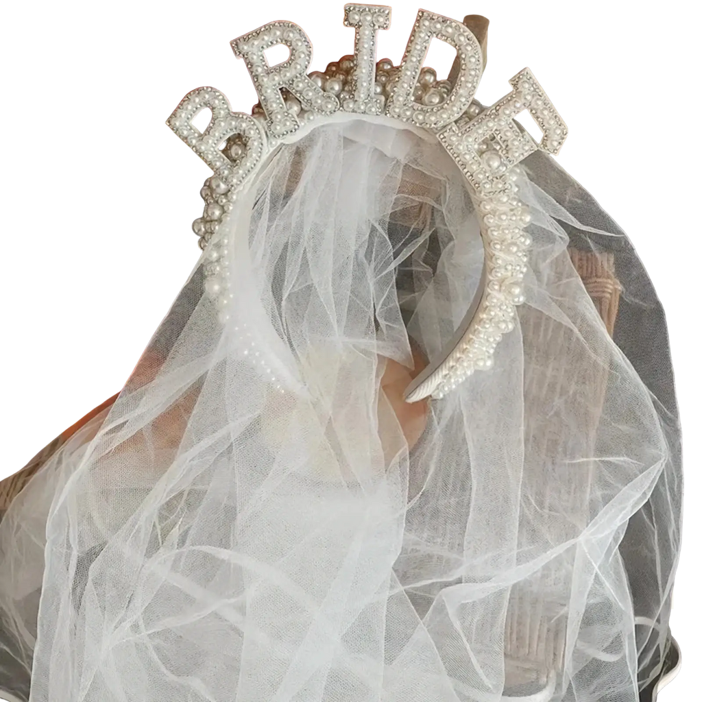 A sparkling white bride headband pearl crown with rhinestones and a delicate sheer veil for weddings