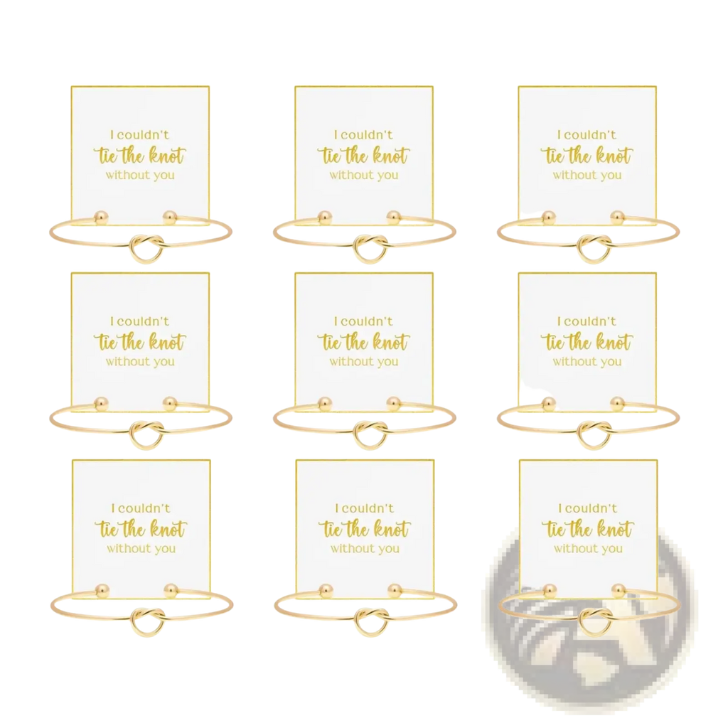 Gold-toned bridesmaid knot bracelets with delicate knots and small spherical accents displayed on matching cards