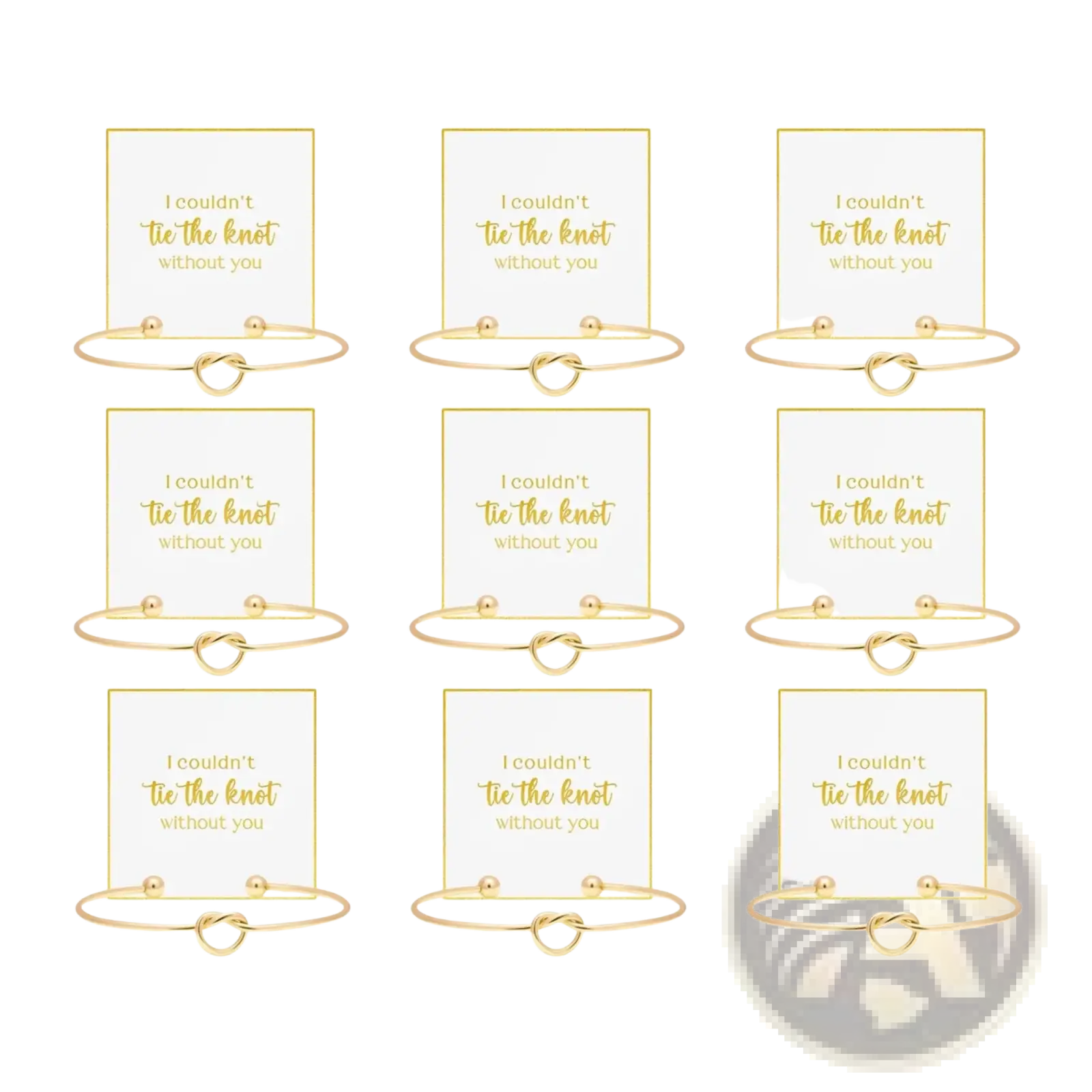 Gold-toned bridesmaid knot bracelets with delicate knots and small spherical accents displayed on matching cards