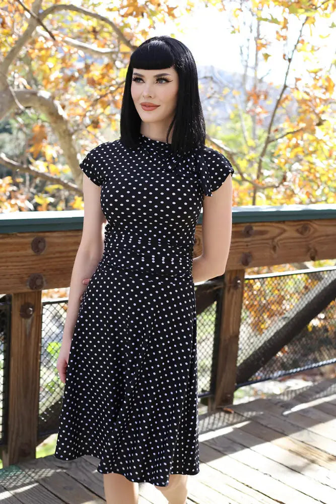 Bridget polka dot retro midi dress in plus size 4x featuring black fabric with white polka dots and short sleeves