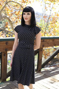 Bridget polka dot retro midi dress in plus size 4x featuring black fabric with white polka dots and short sleeves