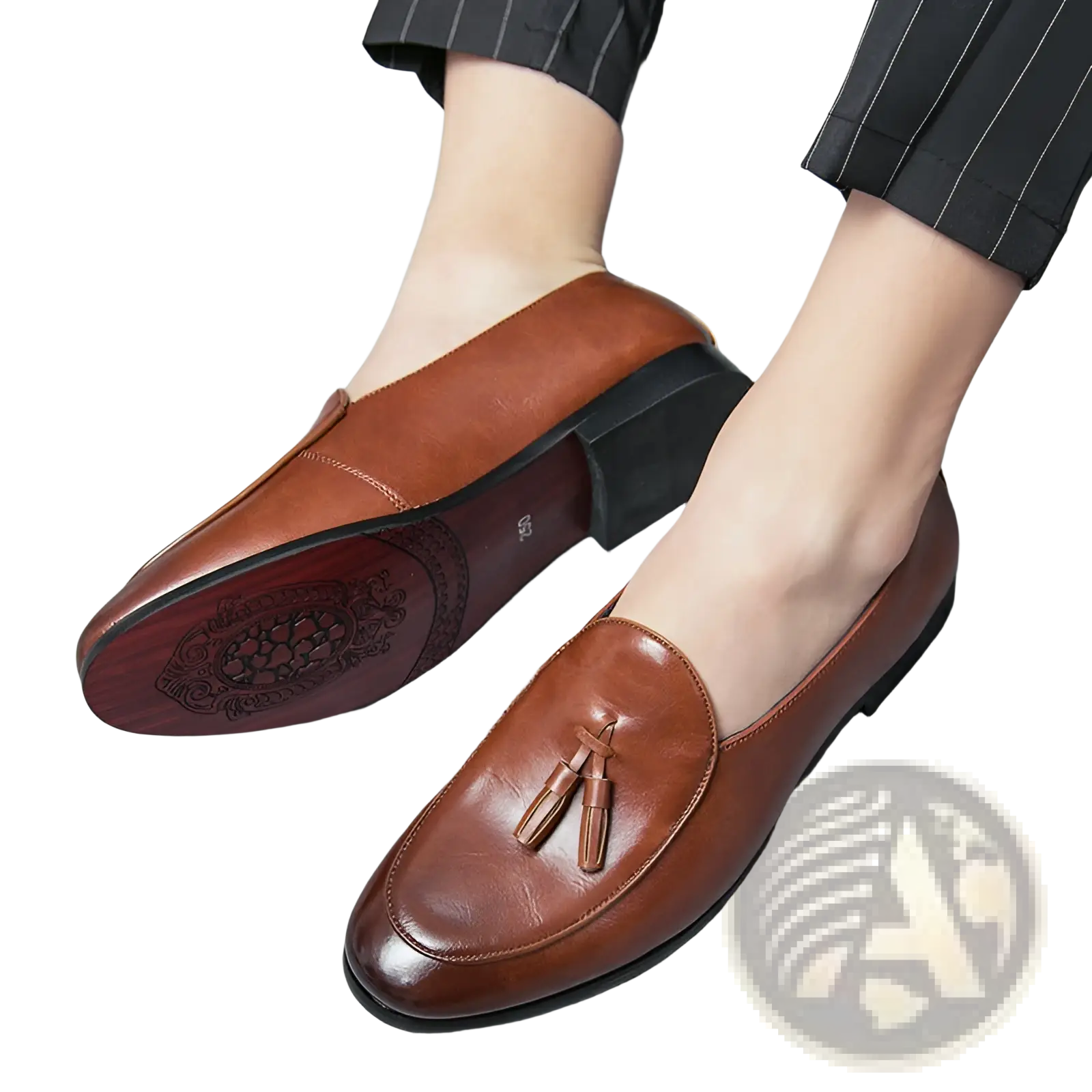 Brown leather British tassel loafers for young men with tassel detail and ornate embossed pattern on the sole