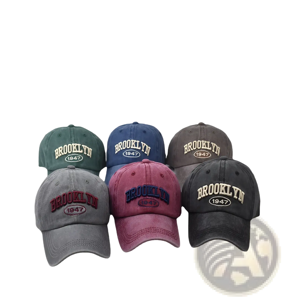 A collection of six vintage-style muted tone cotton baseball hats with embroidered Brooklyn 1947 lettering and emblem