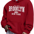 Red oversized fleece hoodie for men featuring white Brooklyn New York lettering and a usa emblem on the front